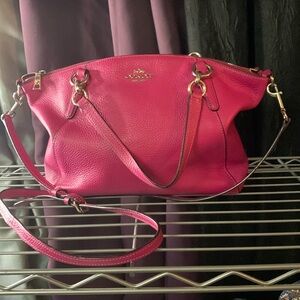 Hot pink pebbled butter leather Coach Brand mid size  purse with Silver hardware